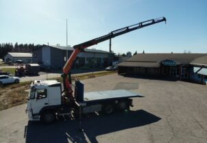 Volvo FM410 koukkuvaihtolava-auto + Palfinger