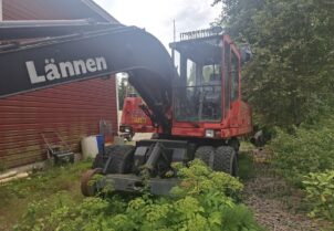 Lännen M318 ratavarustuksella + Engcon