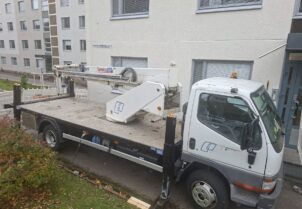 Mitsubishi Canter nostolift 24 henkilönostimella